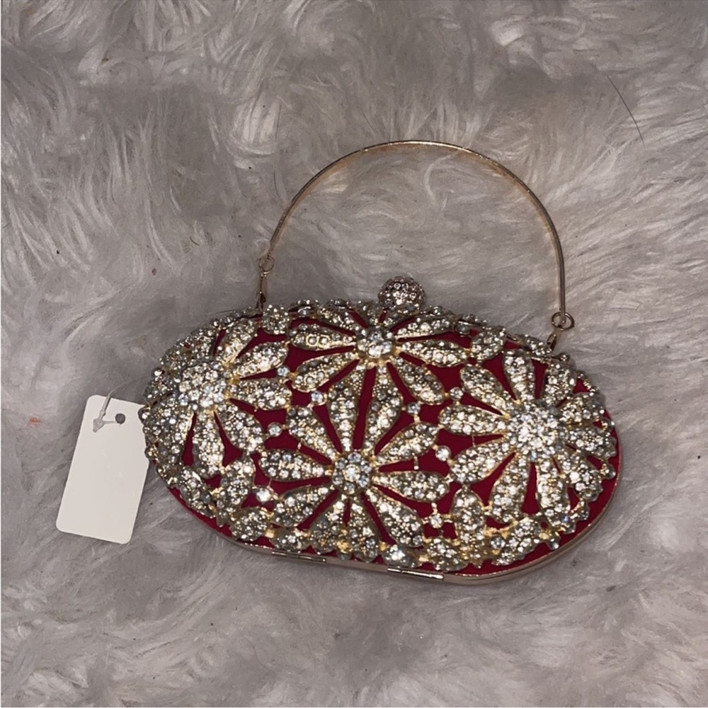 NWT rhinestone gold and red clutch purse/bag.